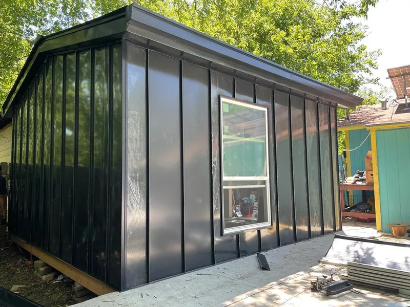 Black standing seam metal wall panels for Metal Roof Installation in Rockingham