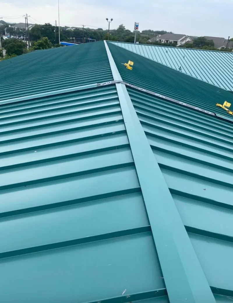 Green commercial metal roof ridge and valley for Metal Roof Repair in Rockingham