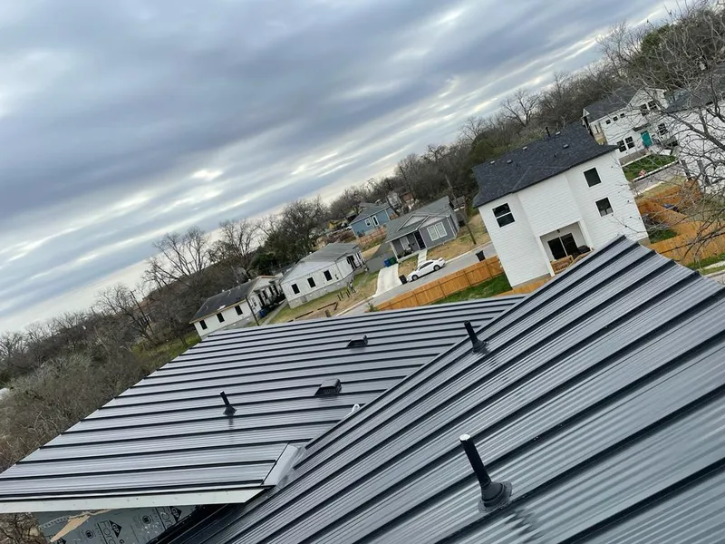 Standing seam metal roof panels with vents for Skylight Repair in Rockingham